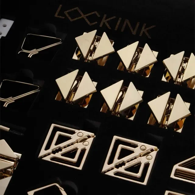Close-up of LOCKINK BDSM kit polished metal hardware and organized accessory details