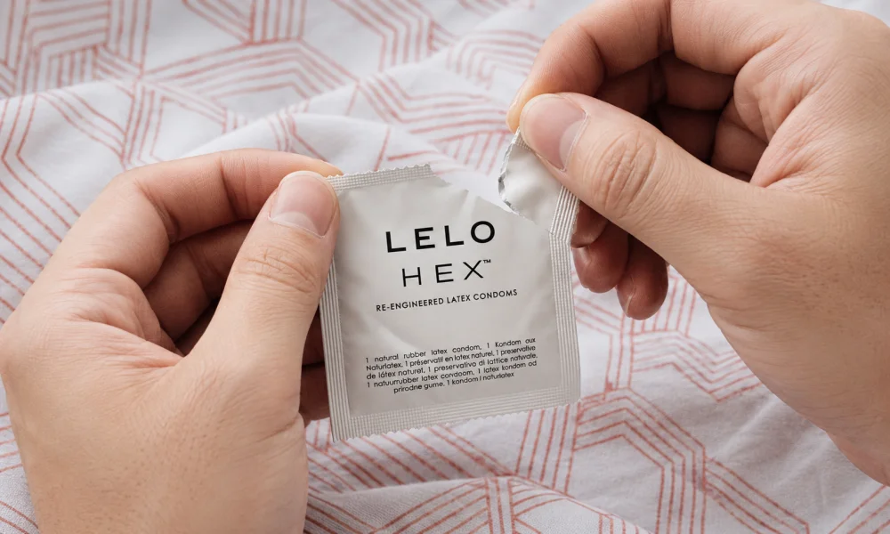 LELO HEX condom packets shown sealed and partially opened LELO HEX condom packets shown sealed and partially opened