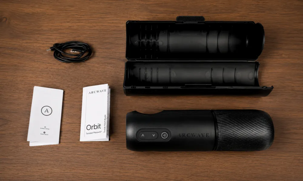 Arcwave Orbit with storage case, charging cable, user manuals and included accessories arcwave orbit box contents and accessories
