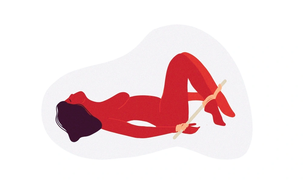 Spreader Bar Legs bondage position using padded cuffs and an adjustable bar